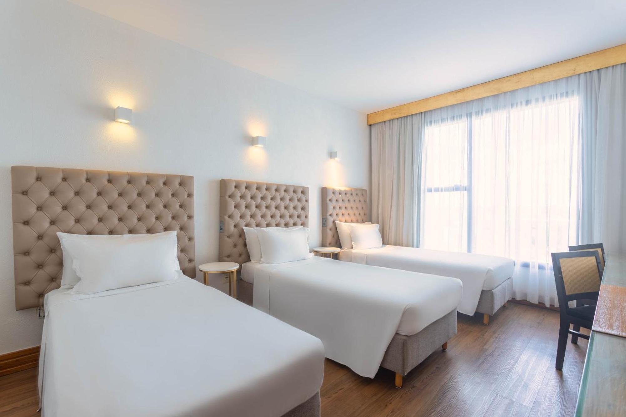 Ouro Minas Hotel Belo Horizonte, Dolce By Wyndham Exteriör bild A room at the hotel
