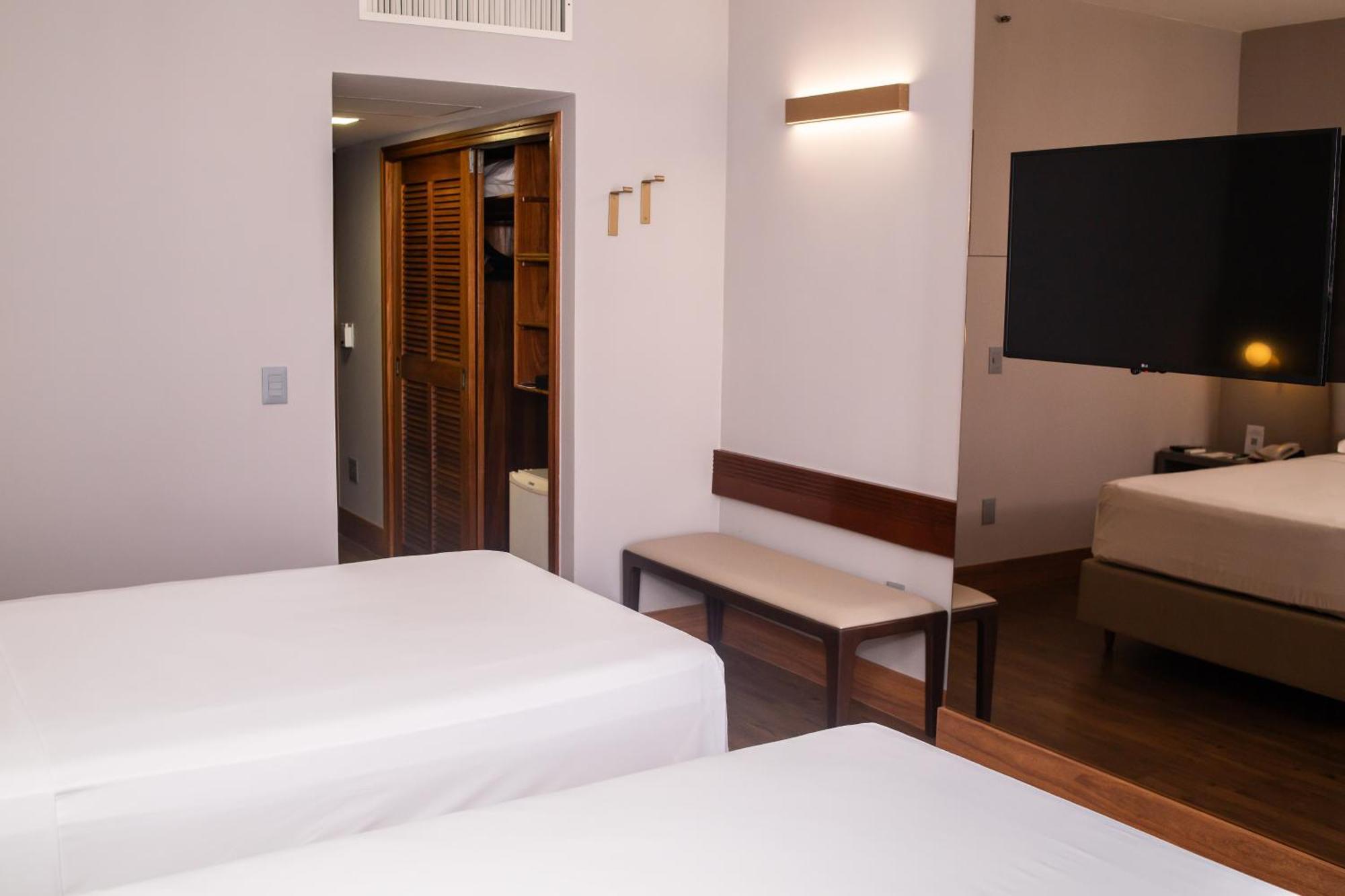 Ouro Minas Hotel Belo Horizonte, Dolce By Wyndham Exteriör bild A room at the hotel