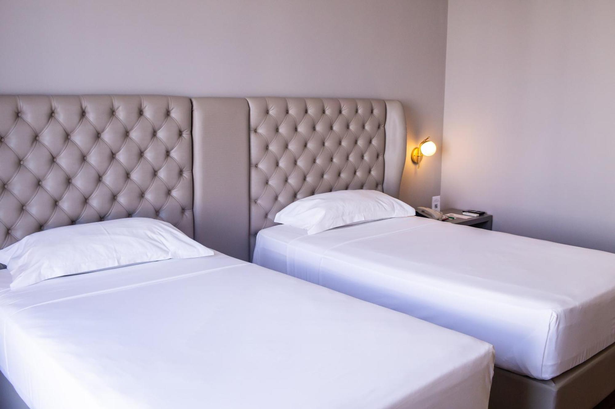 Ouro Minas Hotel Belo Horizonte, Dolce By Wyndham Exteriör bild A room at the hotel