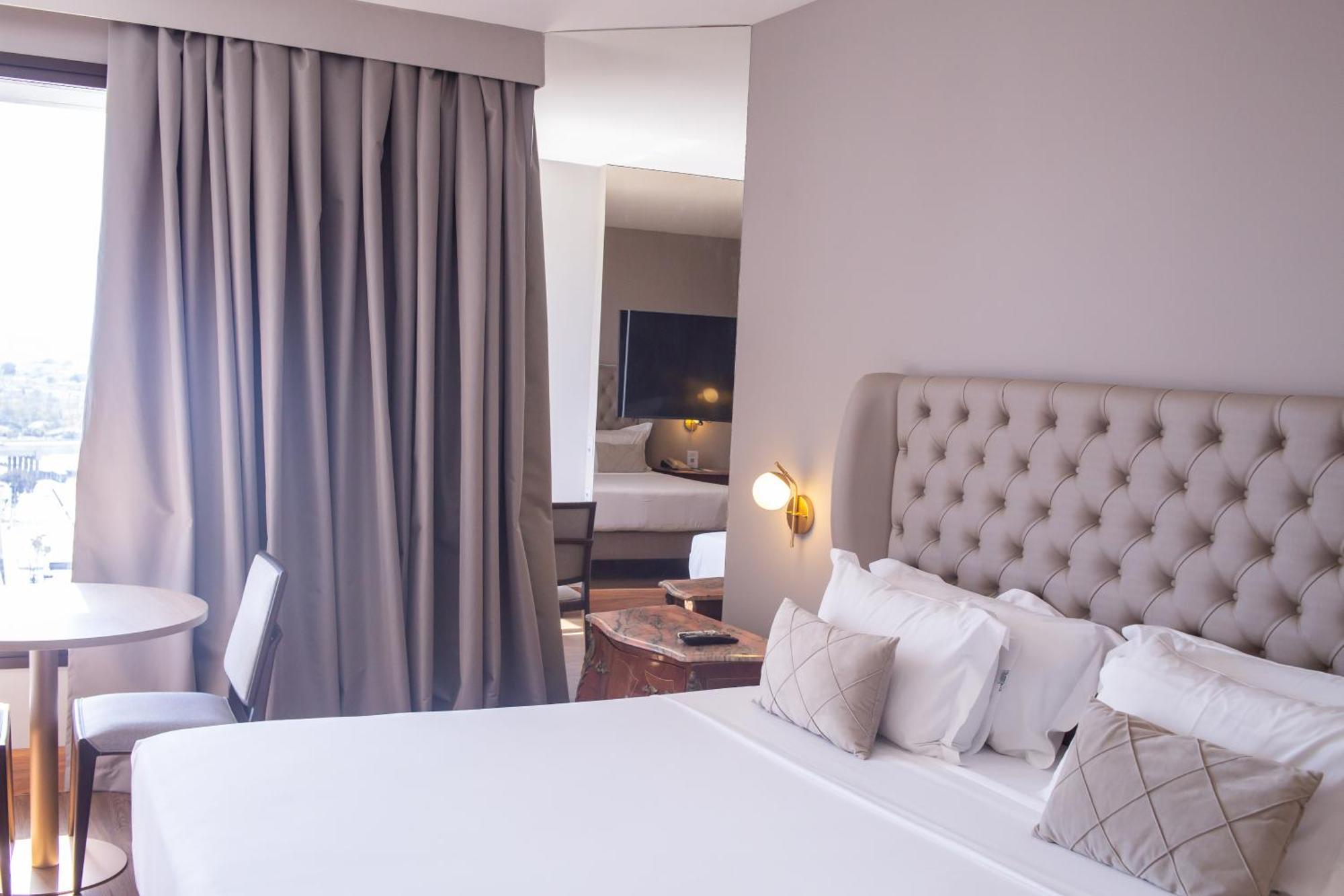 Ouro Minas Hotel Belo Horizonte, Dolce By Wyndham Exteriör bild A bedroom at the hotel