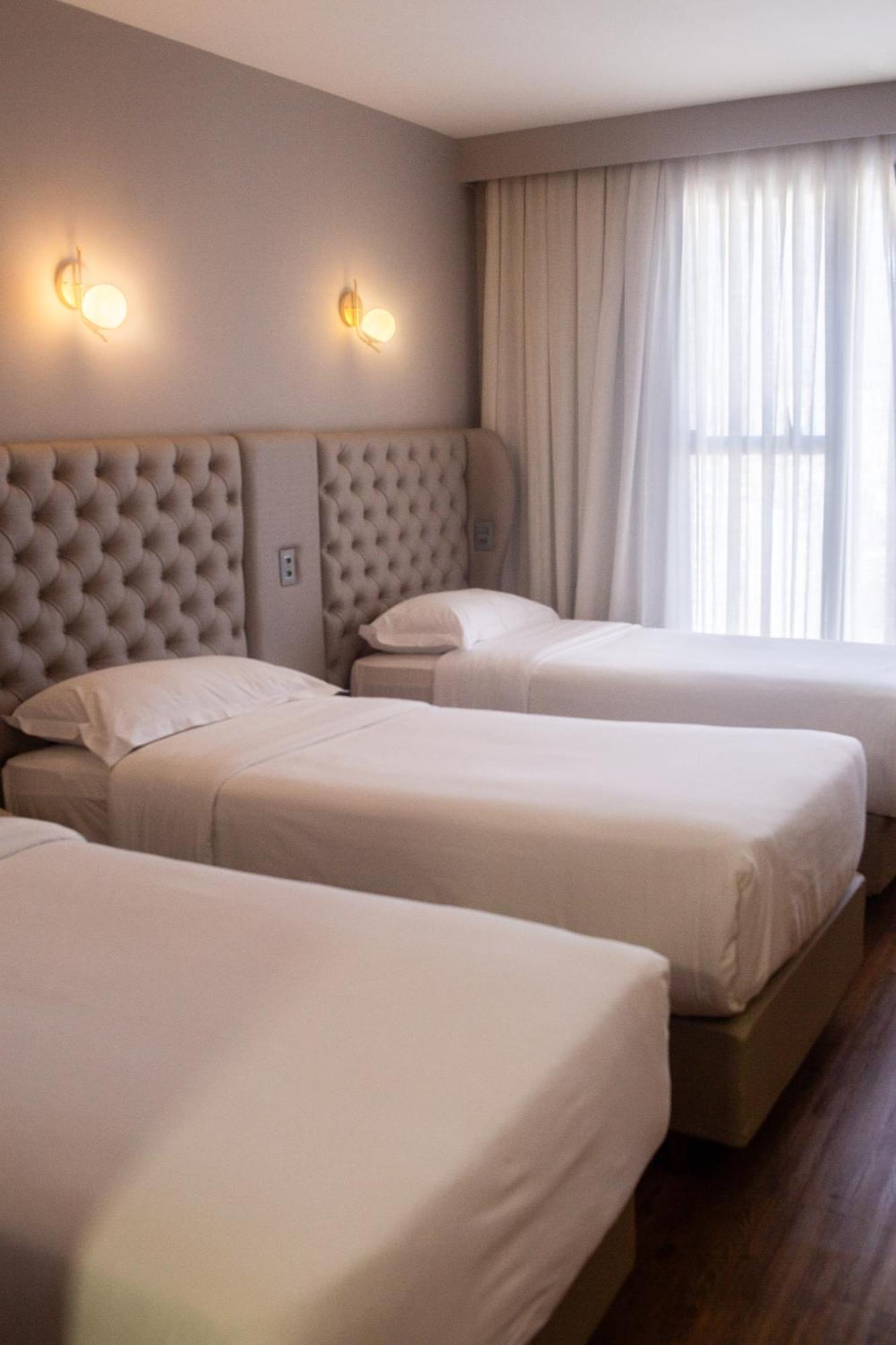 Ouro Minas Hotel Belo Horizonte, Dolce By Wyndham Exteriör bild A room at the hotel